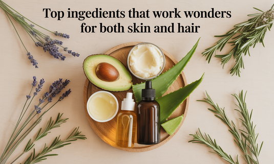 Flat lay of natural beauty ingredients like aloe vera, argan oil, and coconut oil for healthy skin and hair on a white background.