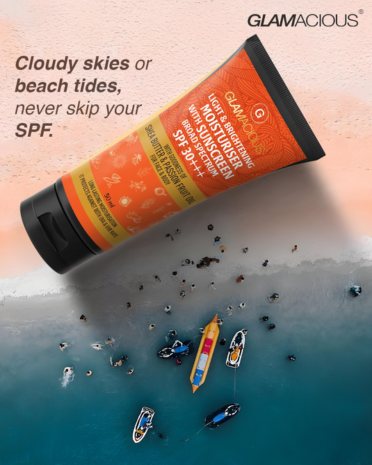 Smiling woman applying lightweight moisturiser on glowing skin in summer