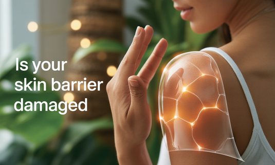 Woman gently touching her irritated face, showing signs of damaged skin barrier before using Glamacious skincare products